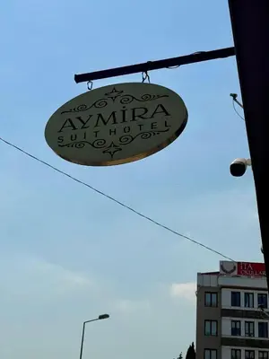 a sign hanging from the side of a building at Aymira Suite Hotel in Istanbul
