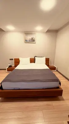 a bedroom with a large bed in a room at The Green Park Taksim in Istanbul