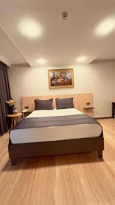 a bedroom with a large bed in a room at The Green Park Taksim in Istanbul