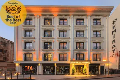 a large white building with a sign that reads best of the best at Demiray Hotel Old City in Istanbul
