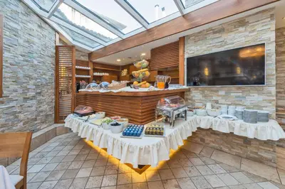 a dining room with two tables and a glass ceiling at The Million Stone Hotel - Special Category in Istanbul