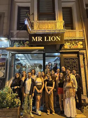 a group of people standing in front of a store at Mr Lion Kumkapı Otel in Istanbul