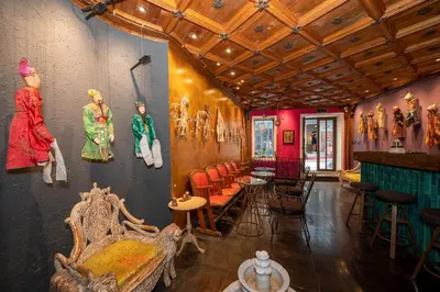 a room with statues of women on the wall at Taksim Antique Hotel in Istanbul