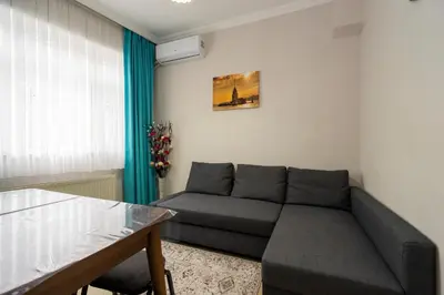 a living room with a couch and a table at Blue Mosq- Three Storey Detached Villa in Istanbul