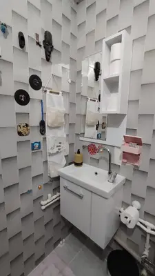 a white bathroom with a sink and a toilet at Nur home 2 in Istanbul