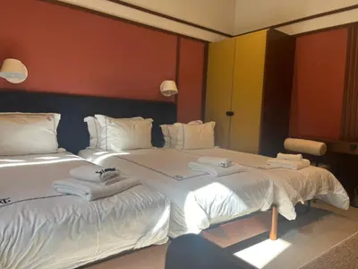 two beds sitting next to each other in a room at GentleTom in Istanbul
