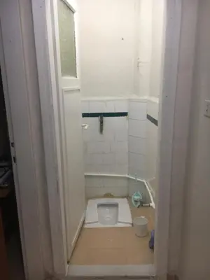 a small bathroom with a toilet in a room at Canan’s apartment in Istanbul
