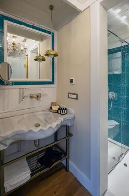 a bathroom with a sink and a shower at Hotel Turkish House in Istanbul