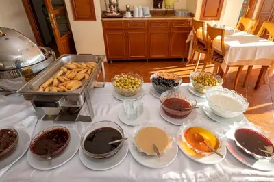 a table topped with plates and bowls of food at Hotel Erdal in Istanbul