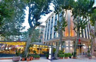 a city street with trees and a building at AHC Ayasofya Hotel - Special Class in Istanbul