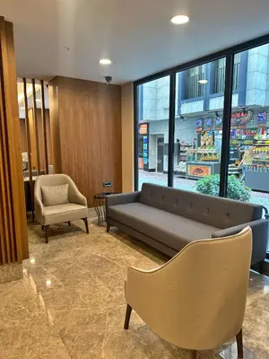 a lobby with a couch and chairs in a store at Hotel Sapphire in Istanbul