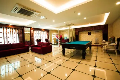 a living room with a pool table in it at World Point Hotel Istanbul in Istanbul