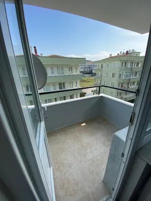 a balcony with a view of a building at ANA GÜNEY Apart Otel in Nilüfer