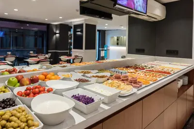 a buffet line with many different types of food at Dream Bosphorus Hotel in Istanbul