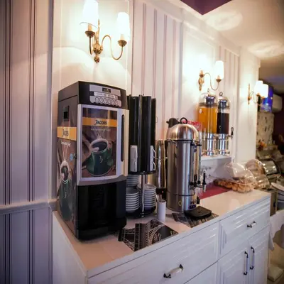 a kitchen with a coffee machine on a counter at Dream Bosphorus Hotel in Istanbul
