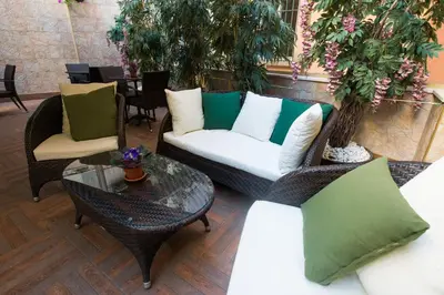 a patio with a couch and chairs and a table at Antea Hotel Oldcity -Special Category in Istanbul