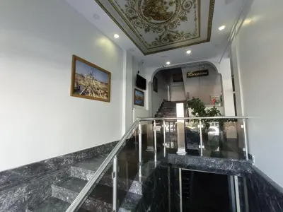 a lobby with a staircase and a ceiling at Emin Konak Hotel in Istanbul