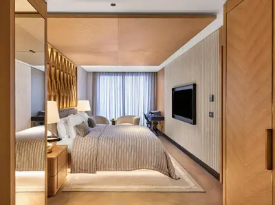 a hotel room with a bed and a television at Vakko Hotel and Residence in Istanbul