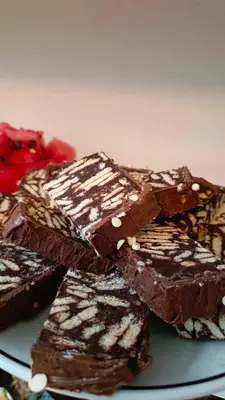 a pile of chocolate desserts on a plate at BALPETEK HOTEL in Istanbul