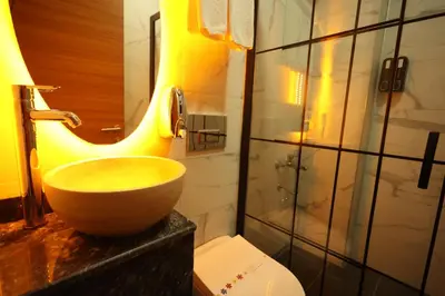 a bathroom with a sink and a toilet at Asmali Hotel in Istanbul