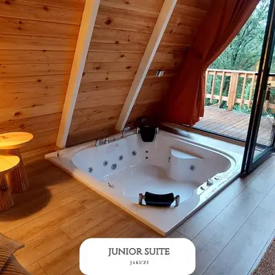 a jurer suite with a tub in a house at VADİ BUNGALOV SAPANCA in Sapanca
