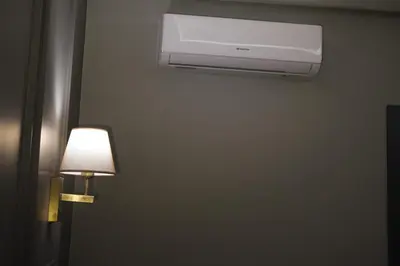 a room with a air conditioner on the wall at The Pearl Airport Hotel in Arnavutköy
