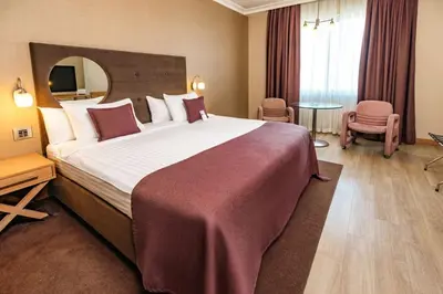 a bedroom with a large bed in a hotel room at WOW Airport Hotel in Istanbul