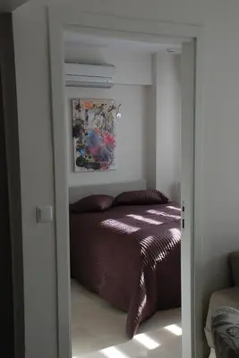 a bedroom with a bed in a small room at Bursa Park Apart Hotel in Bursa