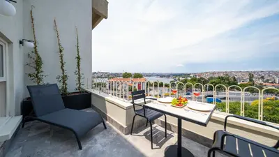 a balcony with a table and chairs and a view at The Gift Hotel in Istanbul