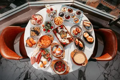 a table with a bunch of food on it at Hotel De Reve Galata-Special Class in Istanbul