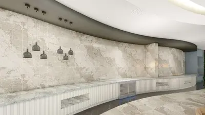 a rendering of a lobby with a stone wall at Hampton By Hilton Istanbul Airport, Arnavutkoy in Istanbul