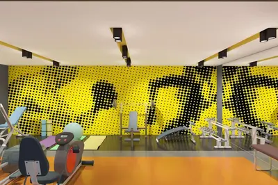 a room with a yellow wall with a painting on it at Hampton By Hilton Istanbul Airport, Arnavutkoy in Istanbul