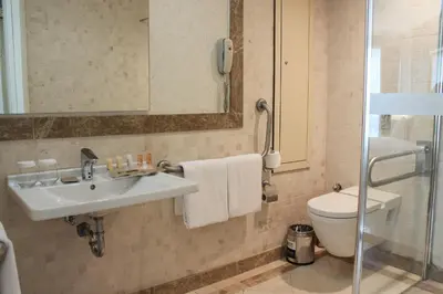 a bathroom with a sink and a toilet at Byotell Istanbul in Istanbul