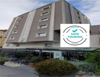 a building with a sign that reads safe tourism at Semsan Hotel in Istanbul