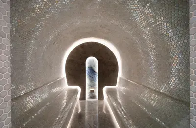 a light at the end of a tunnel with a door at Bentley Hotel Bosphorus - Special Class in Istanbul