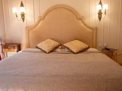 a bedroom with a large bed with two pillows at Fatih Balat Tarihten nezih şık ev- 1 in Istanbul