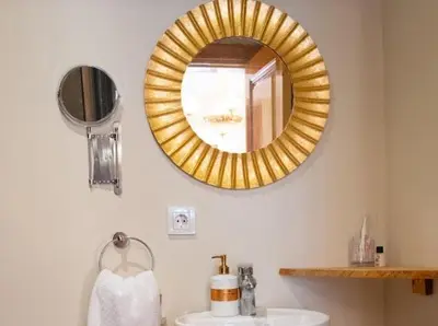 a bathroom with a sink and a mirror on the wall at Fatih Balat Tarihten nezih şık ev- 1 in Istanbul