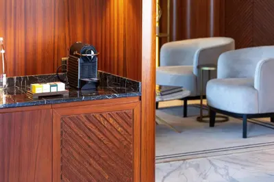 a reception desk with a phone on top of it at The Maestro Hotel in Istanbul