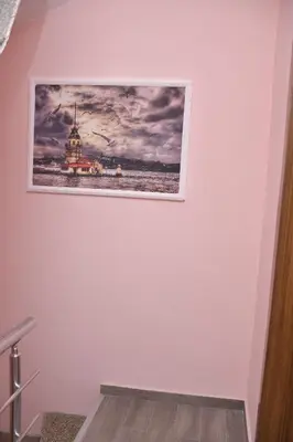 a picture hanging on a wall in a room at Hotel Arinna in Istanbul