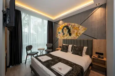 a hotel room with a bed and a television at Comfort Point in Istanbul
