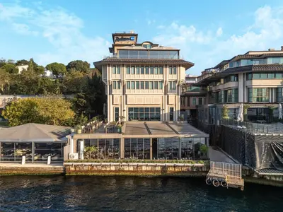 a large building next to a body of water at Radisson Blu Bosphorus Hotel in Istanbul