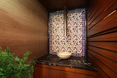 a bathroom with a bowl on a counter next to a window at Skalion Hotel in Istanbul