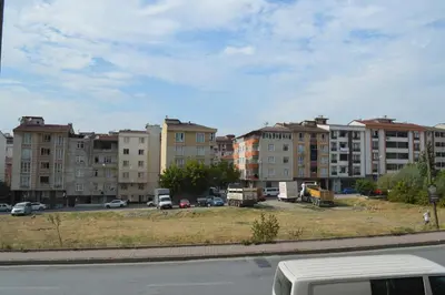 a view of a parking lot with apartment buildings at Classic Suite AA7 in Esenyurt
