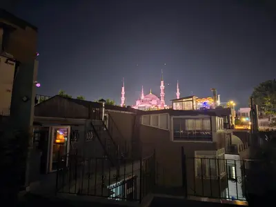 a city at night with a view of the mosque at Hodegon Suite Hotel in Istanbul
