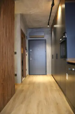an empty hallway with a large door in a room at BlokNoi in Istanbul
