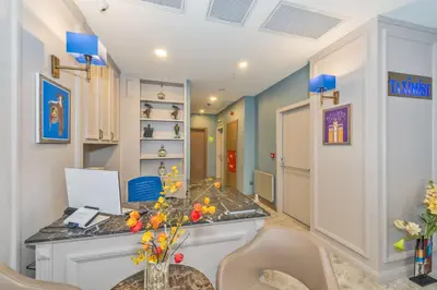 a home office with a desk and chairs at Taximist Hotel in Istanbul
