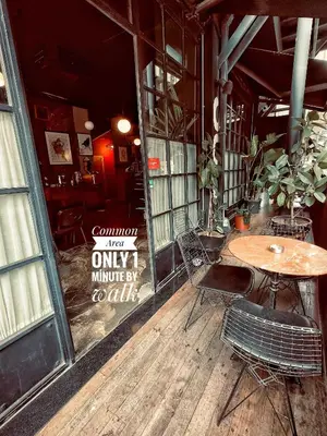a table and chairs in front of a restaurant at Nomad Hostel Karaköy in Istanbul