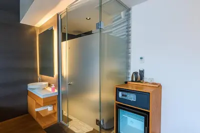 a bathroom with a shower with a sink and a toilet at Aleksandr Pera Hotel in Istanbul