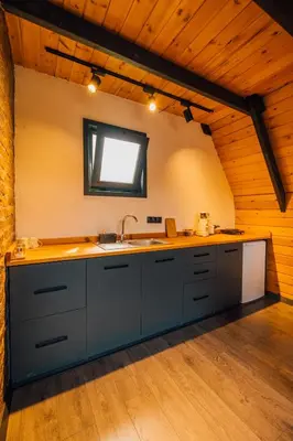 a large kitchen with a sink and a window at Dark Sapanca in Sapanca