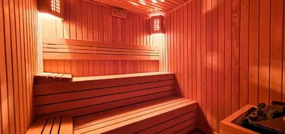 a wooden sauna with a bench in it at Cihangir Flat in Istanbul